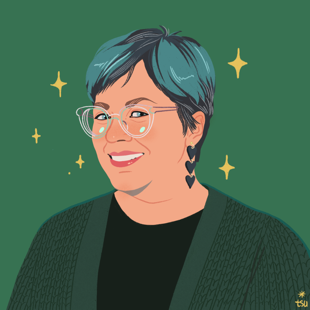 Illustration of Devon Persing. She is a white woman with short hair with teal highlights. She is wearing a large green cardigan, black heart dangling earrings, and glasses with clear frames.